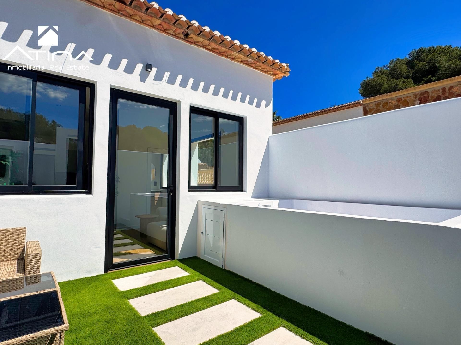 Exterior view of Single-family semi-detached for sale in Jávea / Xàbia  with Private garden, Swimming Pool and Furnished