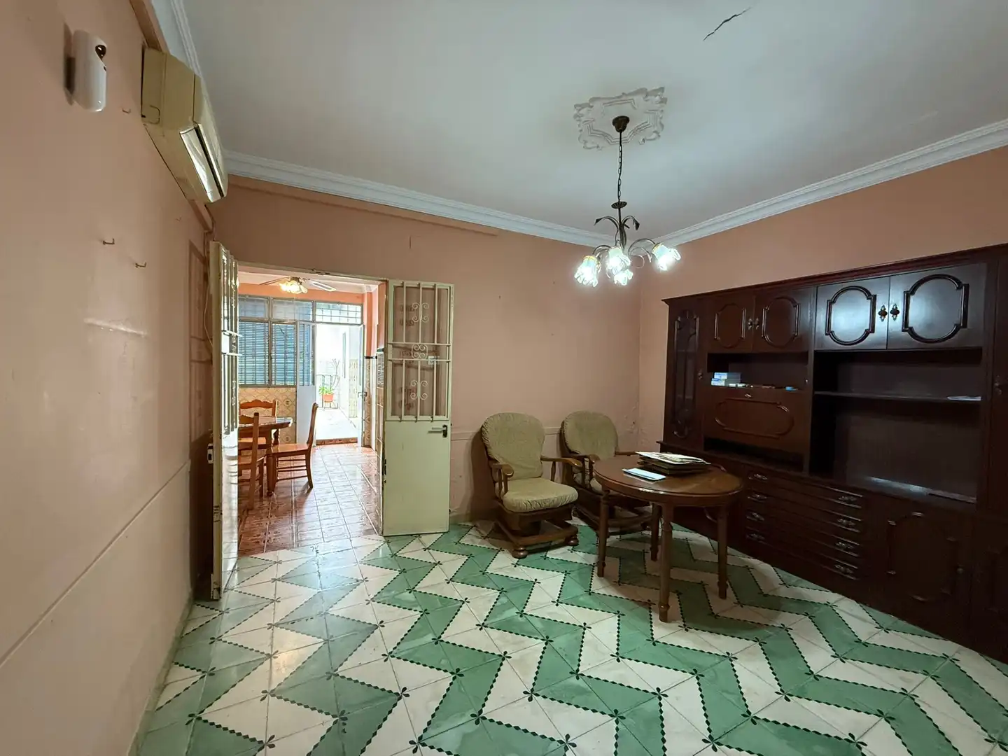 Sala de estar de Casa adosada en venta en Dos Hermanas con Aire acondicionado