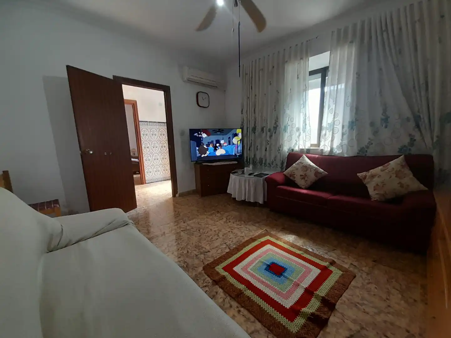 Sala d'estar de Casa adosada en venda en Puertollano amb Aire condicionat i Traster