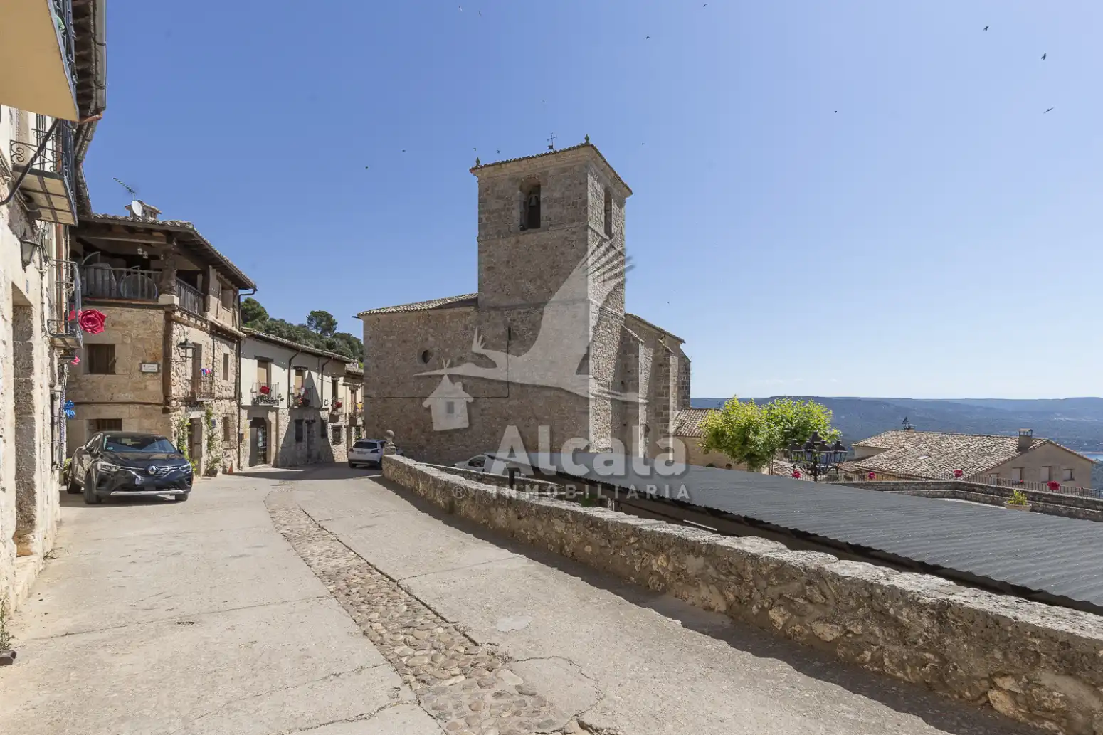 Vista exterior de Casa adosada en venda en Alocén amb Calefacció