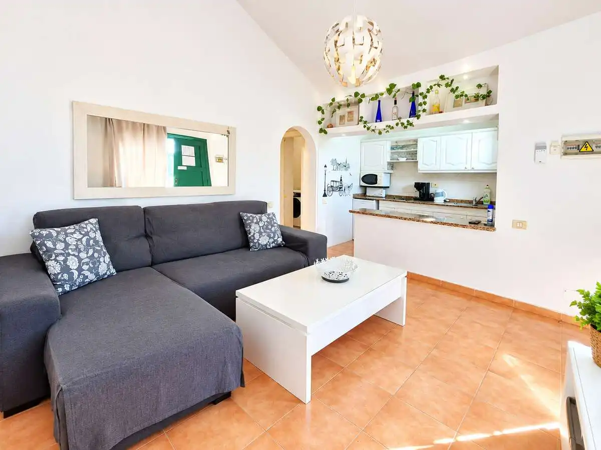 Sala d'estar de Casa o xalet en venda en Tías amb Moblat, Alarma i Piscina comunitària