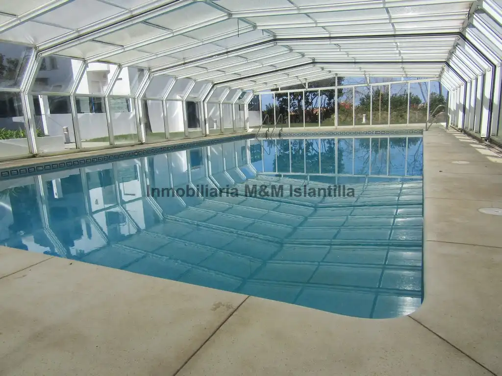 Piscina de Casa adosada en venta en Islantilla con Terraza, Trastero y Amueblado