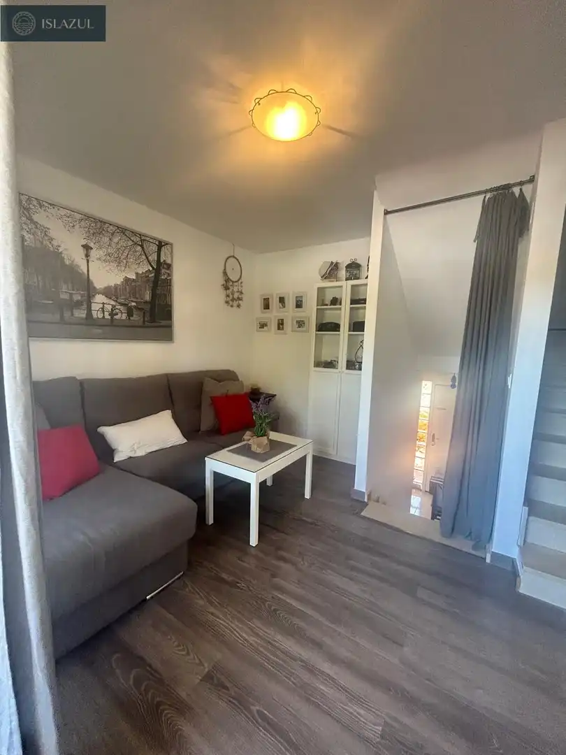 Sala d'estar de Apartament en venda en Isla Cristina amb Aire condicionat, Jardí privat i Terrassa