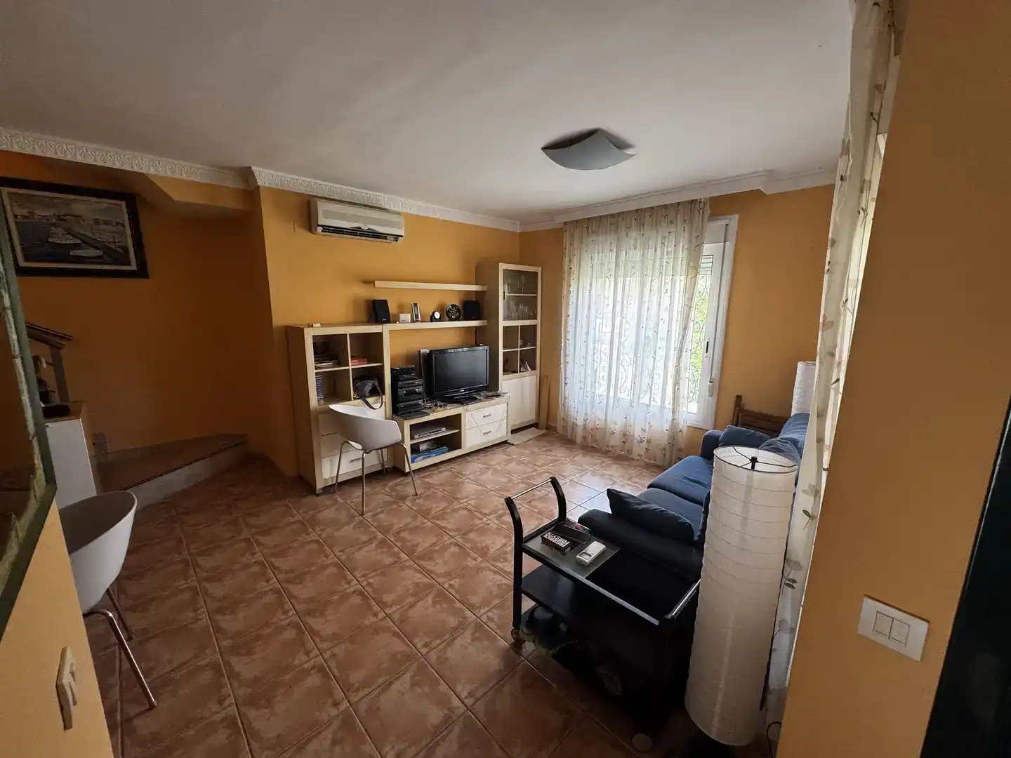 Sala d'estar de Casa adosada en venda en Mont-roig del Camp amb Aire condicionat, Piscina i Balcó