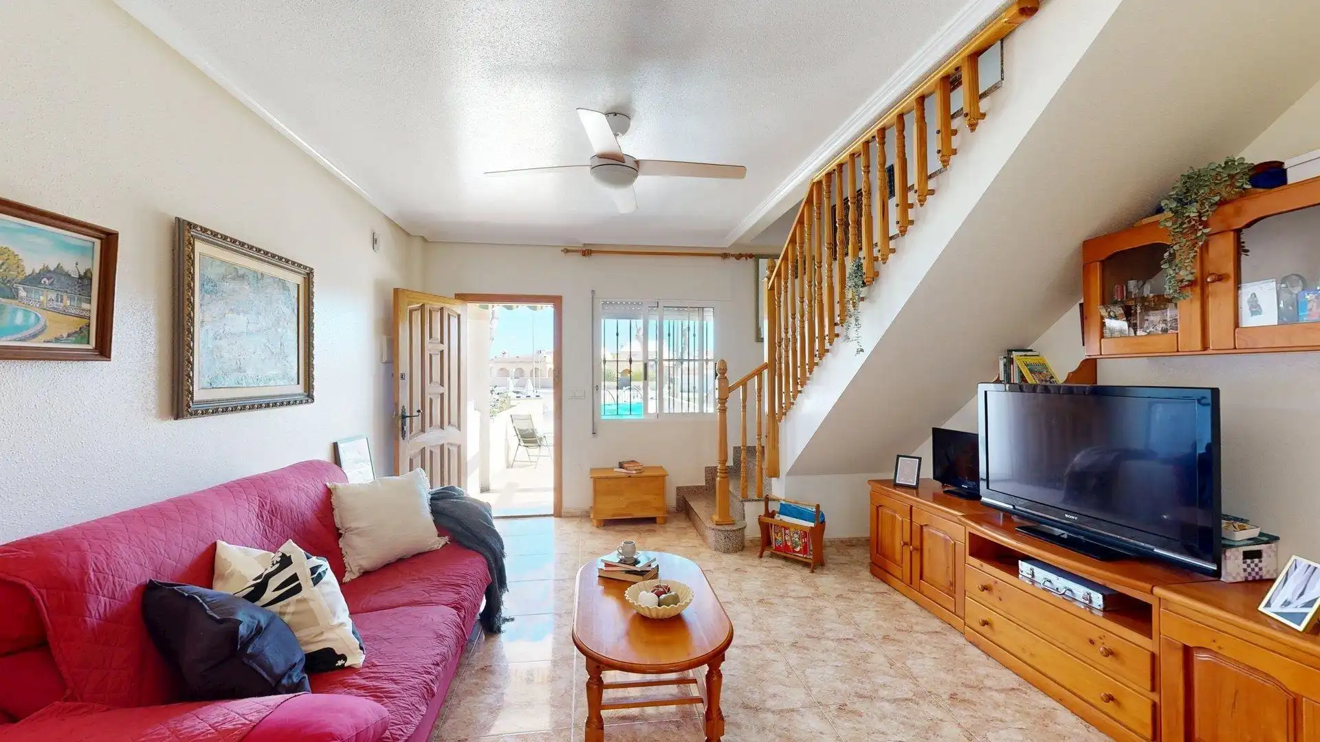 Sala de estar de Casa adosada en venta en Pilar de la Horadada con Jardín privado, Terraza y Balcón