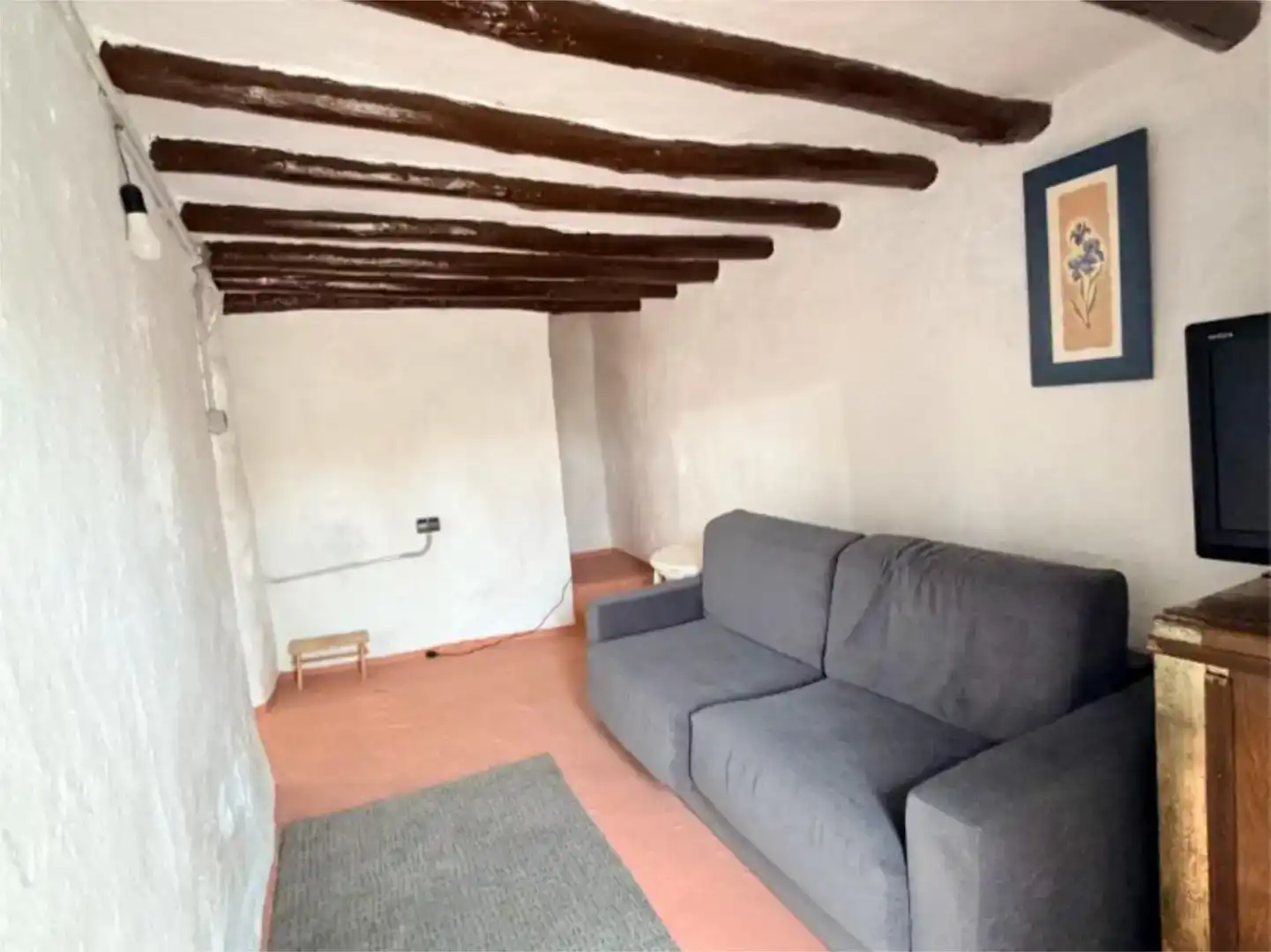 Sala d'estar de Casa adosada en venda en Arriate amb Moblat
