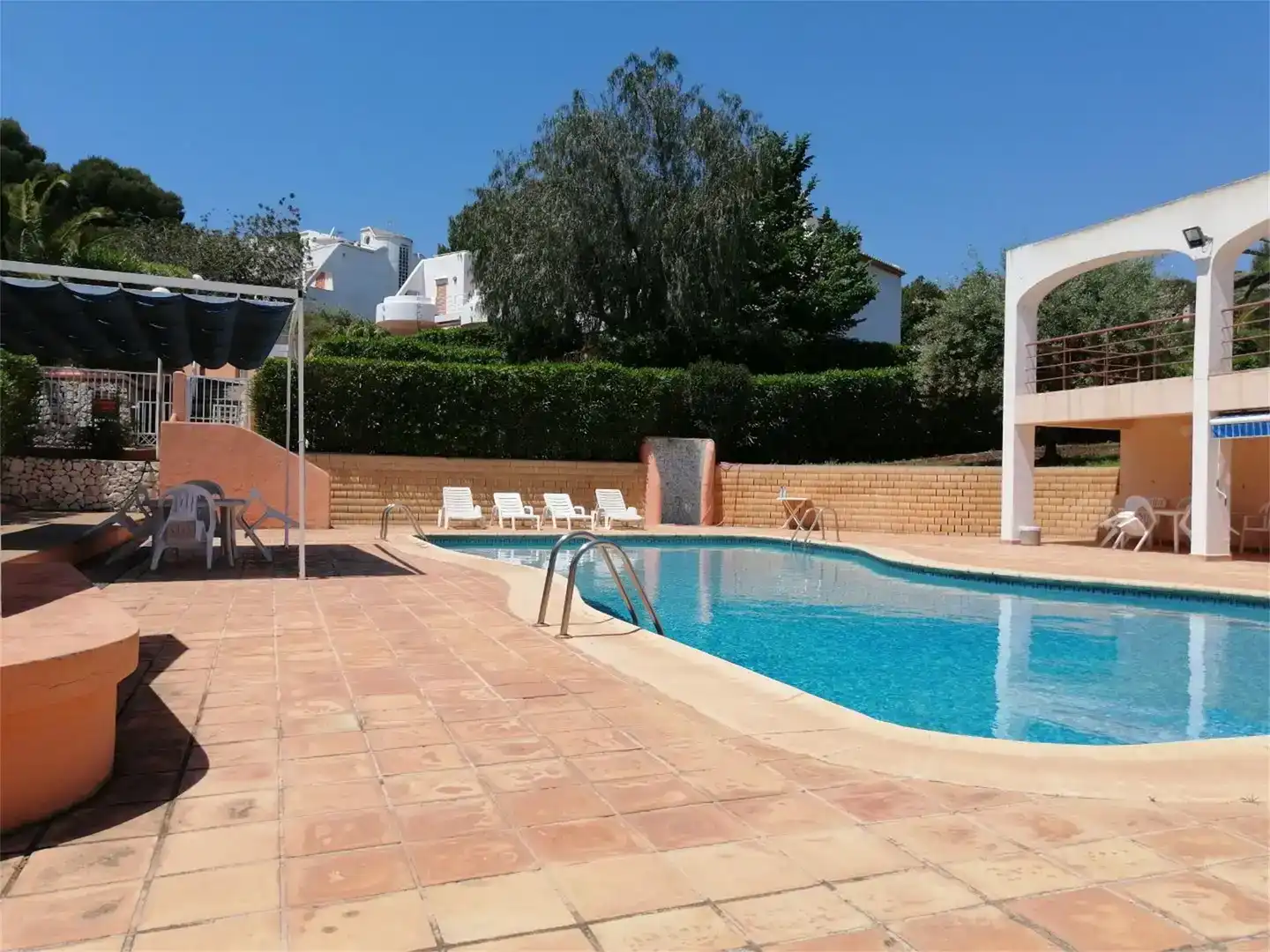 Piscina de Casa adosada de lloguer en Moraira amb Aire condicionat, Jardí privat i Traster