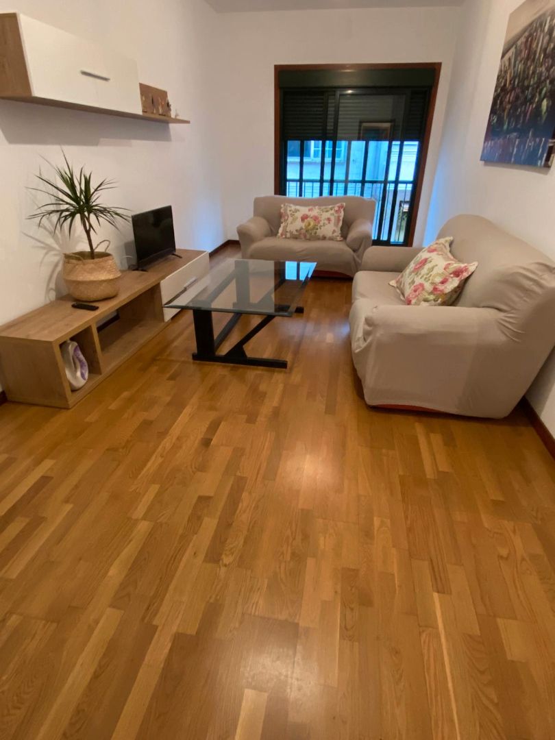 Sala d'estar de Pis en venda en Pontevedra Capital  amb Calefacció, Parquet i Terrassa