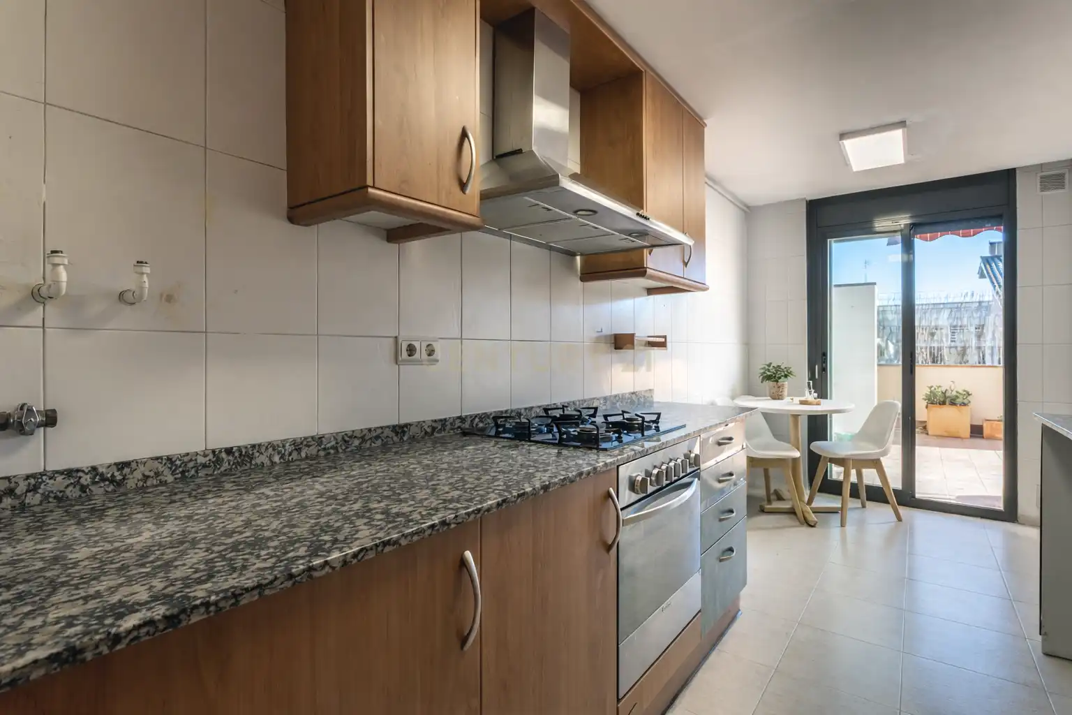 Kitchen of Flat for sale in Sant Celoni  with Air Conditioner and Storage room