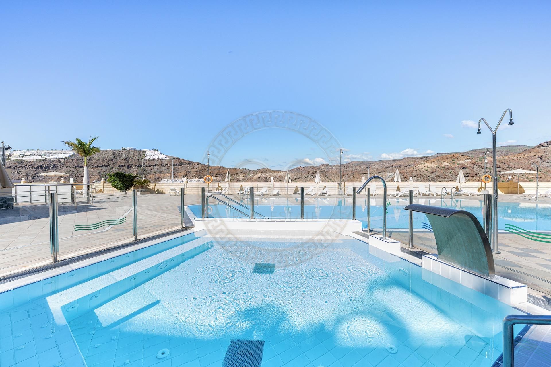 Swimming pool of Single-family semi-detached for sale in Mogán  with Air Conditioner, Private garden and Terrace