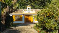 Exterior view of House or chalet for sale in Sanlúcar la Mayor  with Air Conditioner, Heating and Private garden