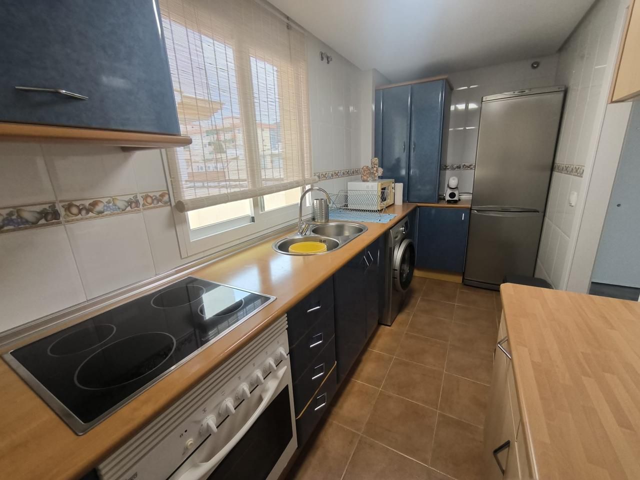 Cuina de Àtic de lloguer en Torremolinos amb Aire condicionat, Terrassa i Moblat