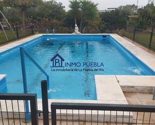 Piscina de Casa o xalet en venda en La Puebla del Río amb Terrassa i Traster