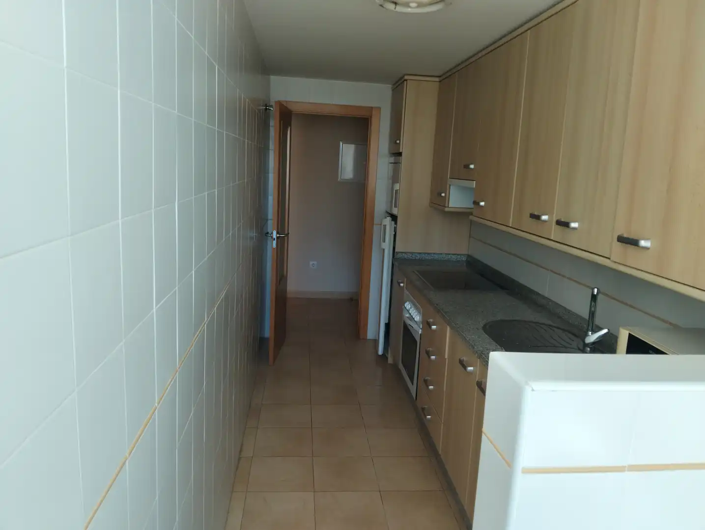 Küche von Wohnung zum Verkauf in La Manga del Mar Menor mit Klimaanlage, Heizung und Privatgarten