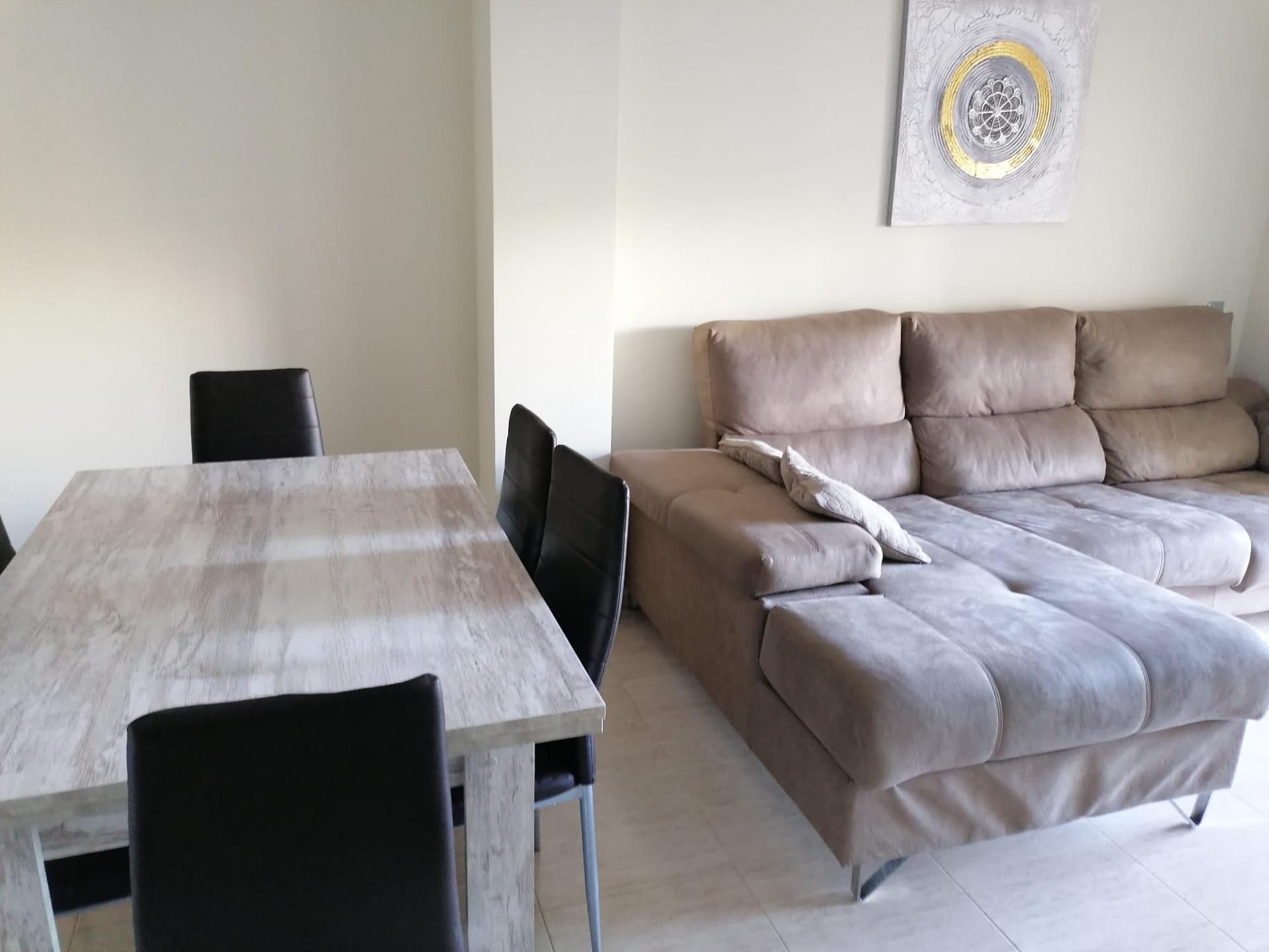 Sala d'estar de Pis de lloguer en  Almería Capital amb Jardí privat, Terrassa i Piscina comunitària