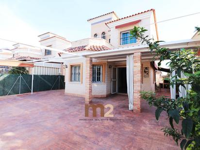 Exterior view of House or chalet for sale in Guardamar del Segura  with Air Conditioner, Terrace and Storage room