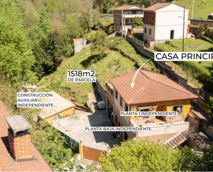 Vista exterior de Casa o xalet en venda en Langreo amb Calefacció, Terrassa i Traster
