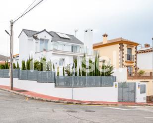 Exterior view of House or chalet for sale in Málaga Capital  with Air Conditioner, Terrace and Swimming Pool