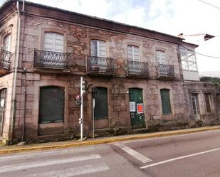 Vista exterior de Casa adosada en venda en Moraña amb Jardí privat