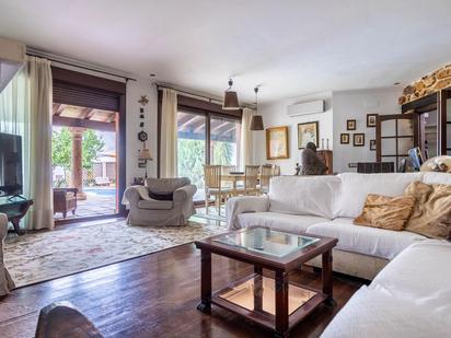 Living room of House or chalet for sale in La Rinconada  with Air Conditioner, Heating and Private garden