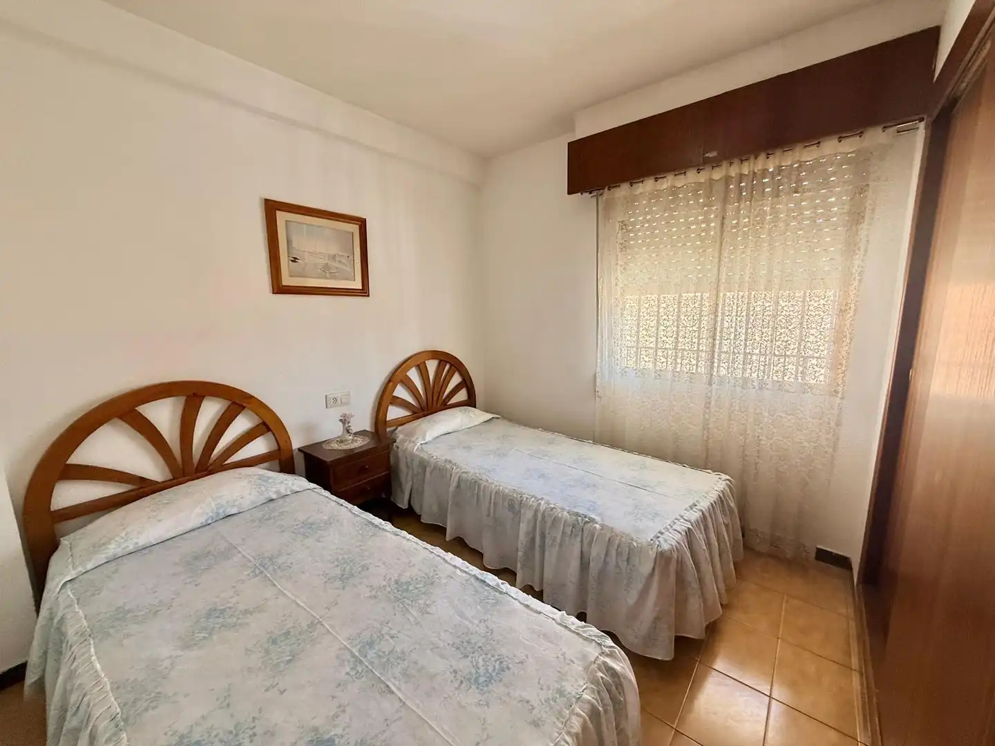 Dormitori de Apartament en venda en Benidorm amb Jardí privat, Terrassa i Moblat