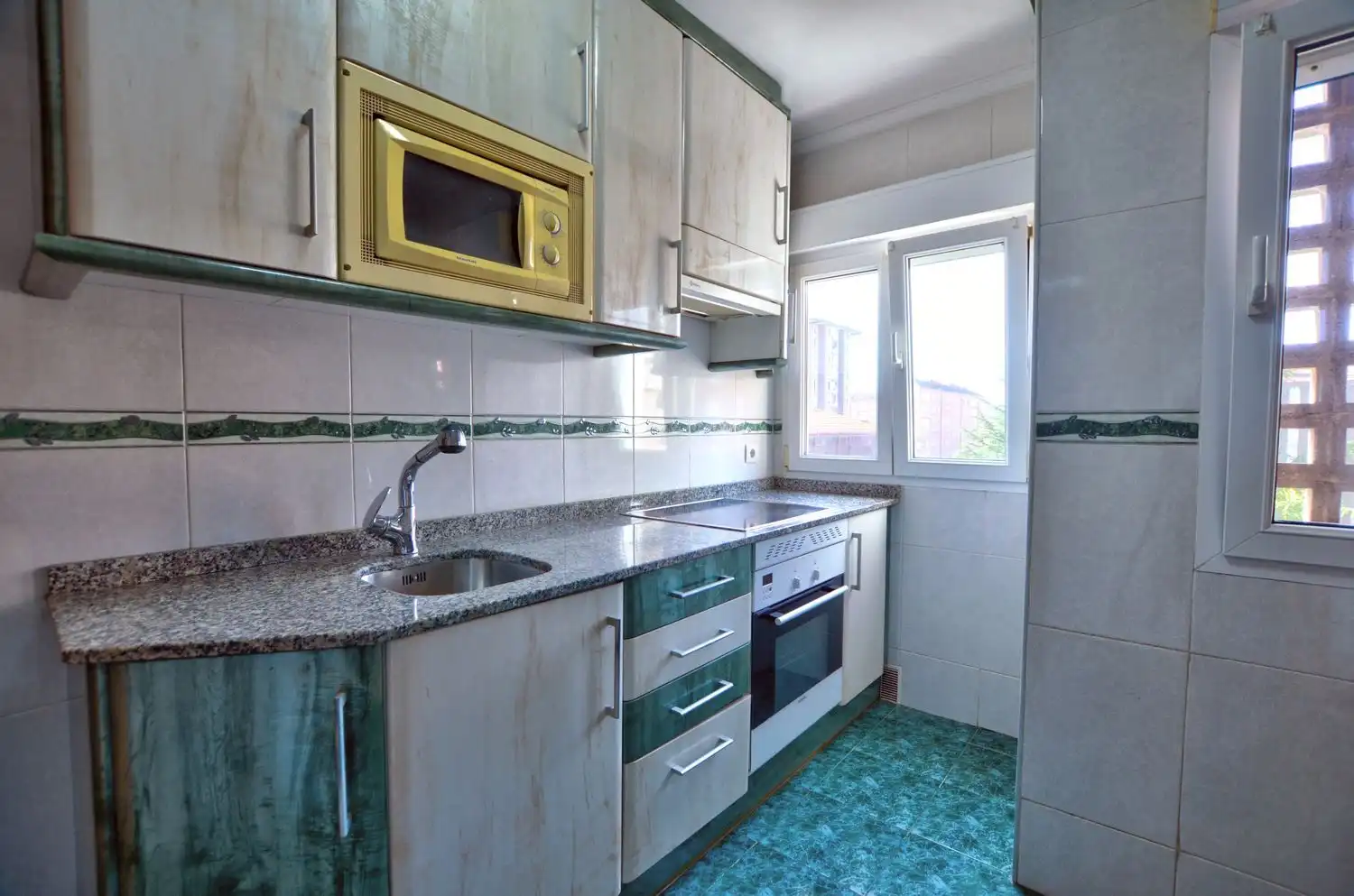 Kitchen of Flat for sale in Gijón   with Storage room and Swimming Pool