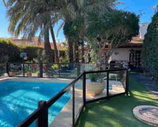 Swimming pool of House or chalet for sale in Roquetas de Mar  with Air Conditioner, Heating and Private garden
