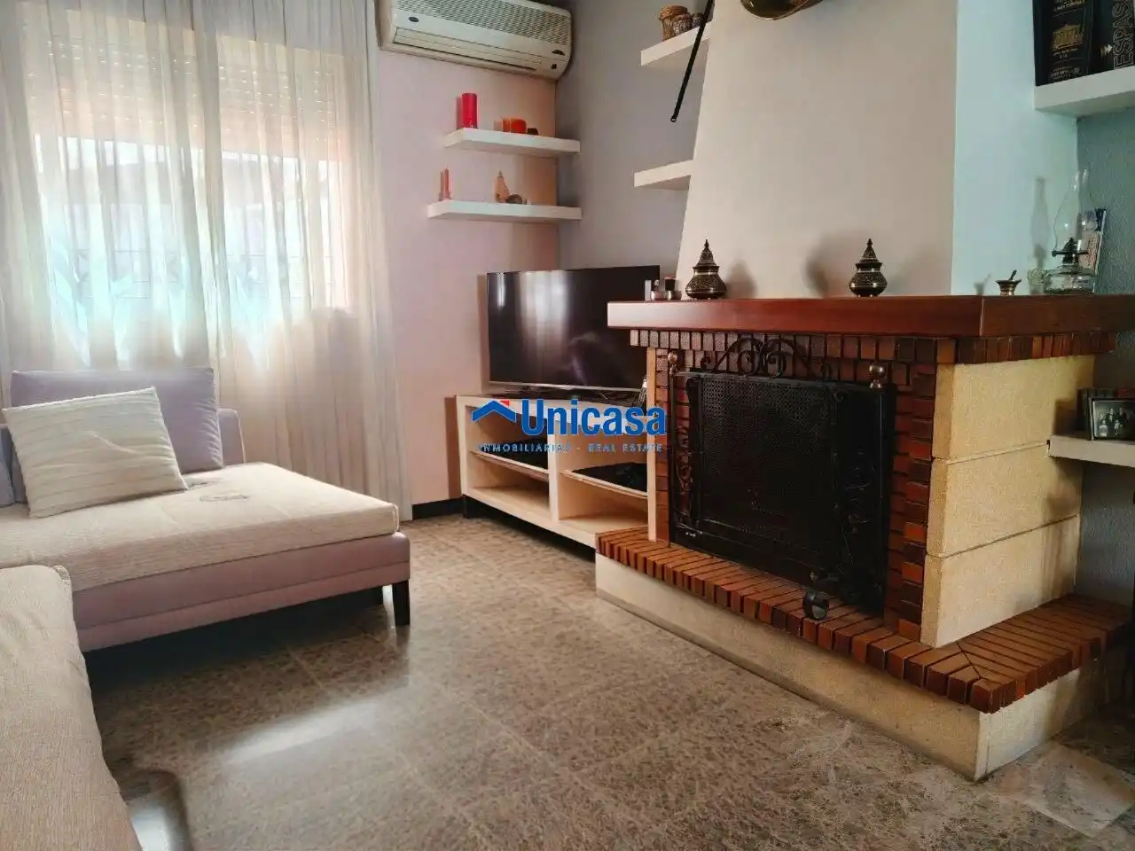 Sala de estar de Casa adosada en venta en Málaga