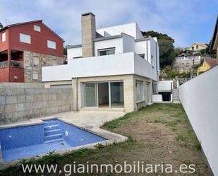 Exterior view of Single-family semi-detached for sale in Baiona  with Terrace and Swimming Pool