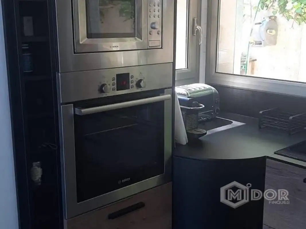 Cuina de Casa o xalet en venda en Sant Feliu de Guíxols amb Aire condicionat, Calefacció i Jardí privat