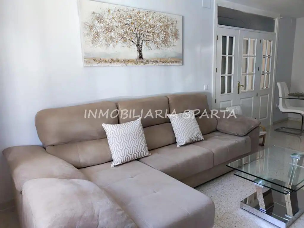 Sala de estar de Casa adosada en venta en Coria del Río con Aire acondicionado, Terraza y Trastero