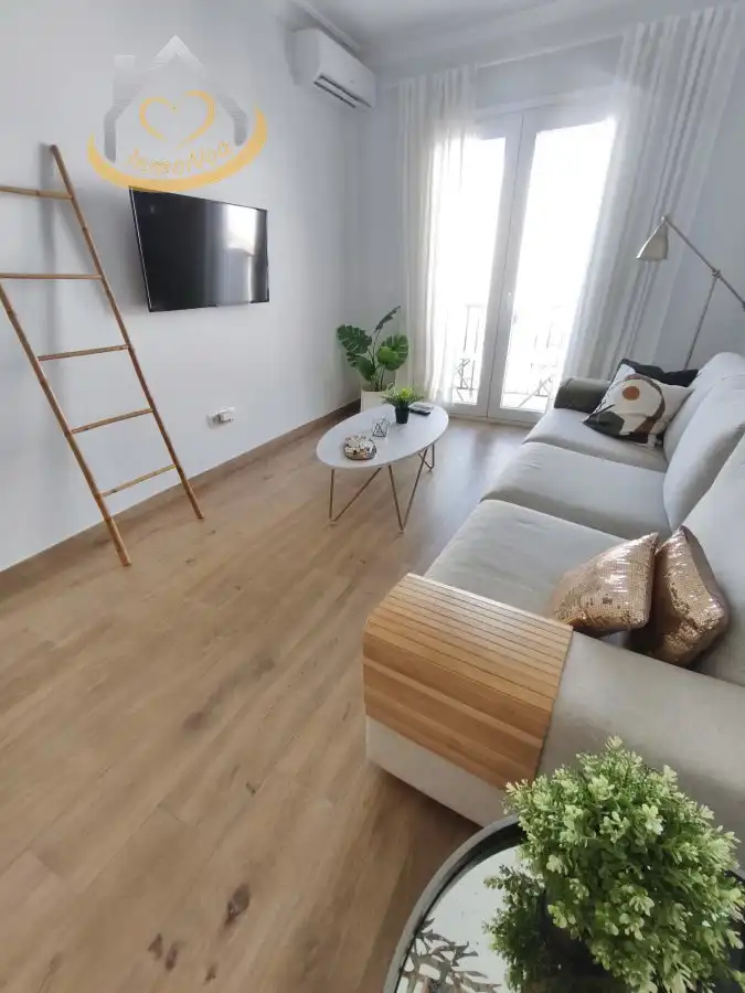 Sala de estar de Piso en venta en Cartaya con Aire acondicionado, Trastero y Amueblado