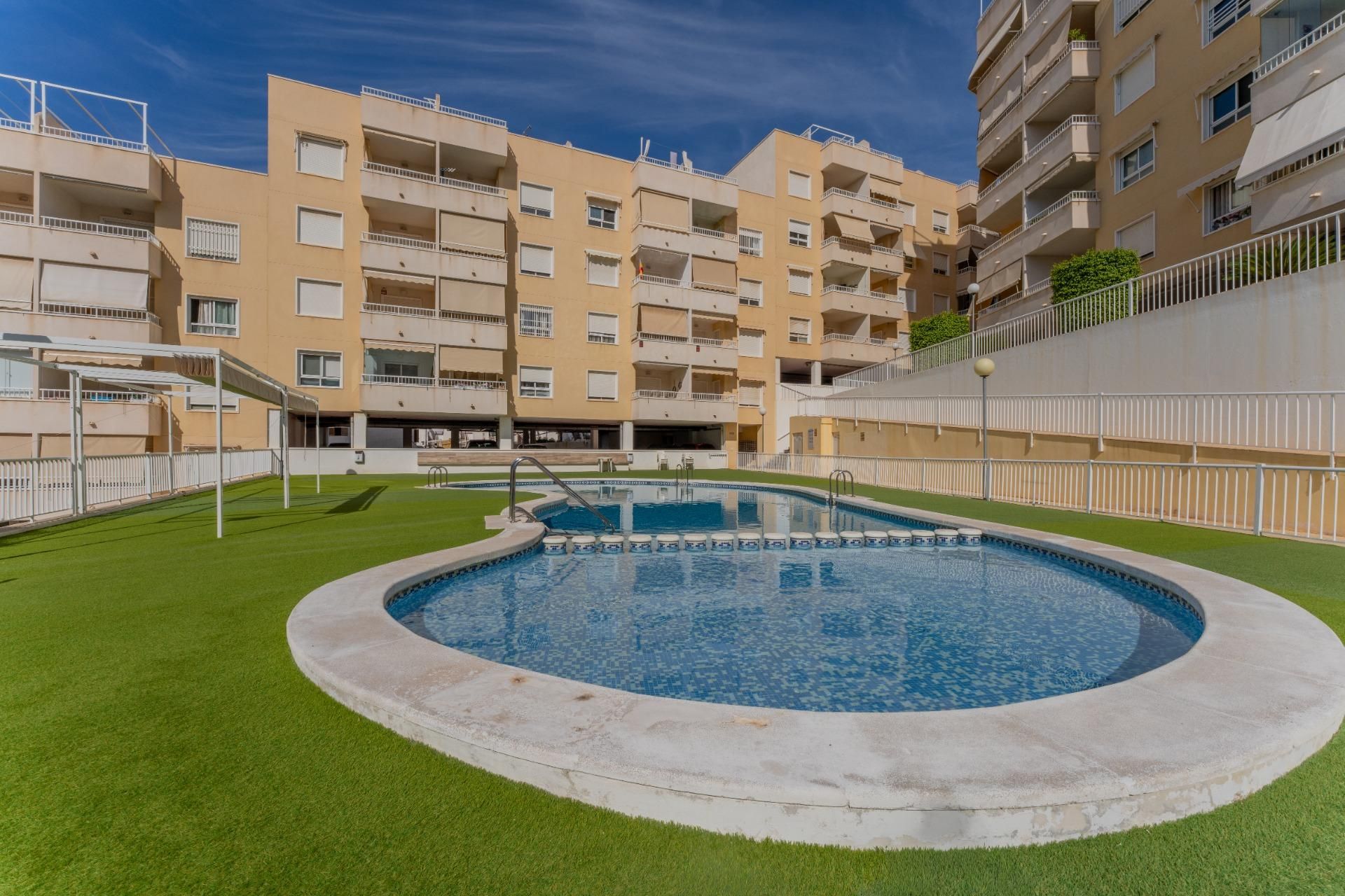 Swimming pool of Flat for sale in Santa Pola  with Air Conditioner, Private garden and Parquet flooring
