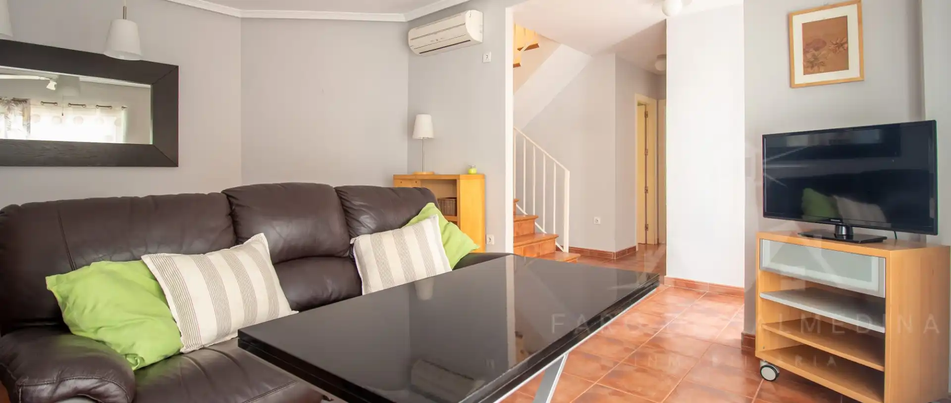 Sala de estar de Casa adosada en venta en Rota con Aire acondicionado, Terraza y Piscina comunitaria