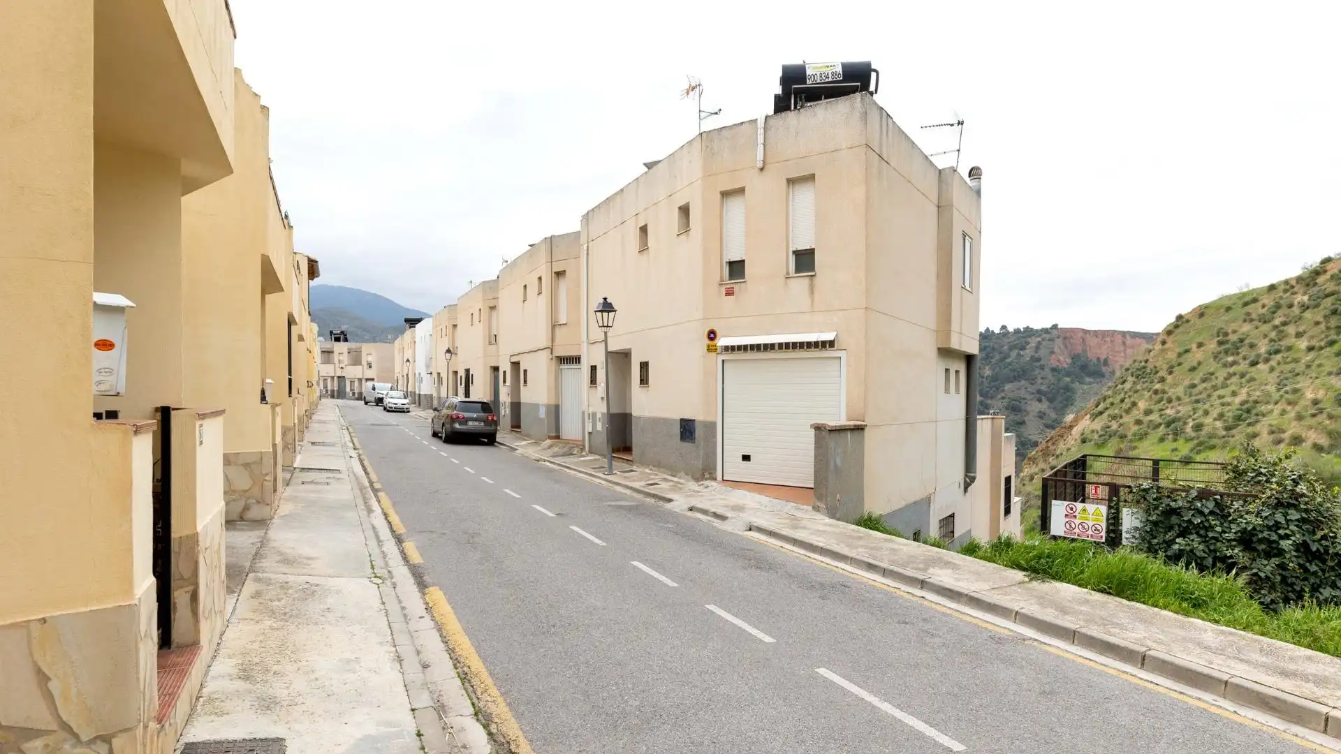 Exterior view of Single-family semi-detached for sale in Cenes de la Vega  with Heating and Terrace