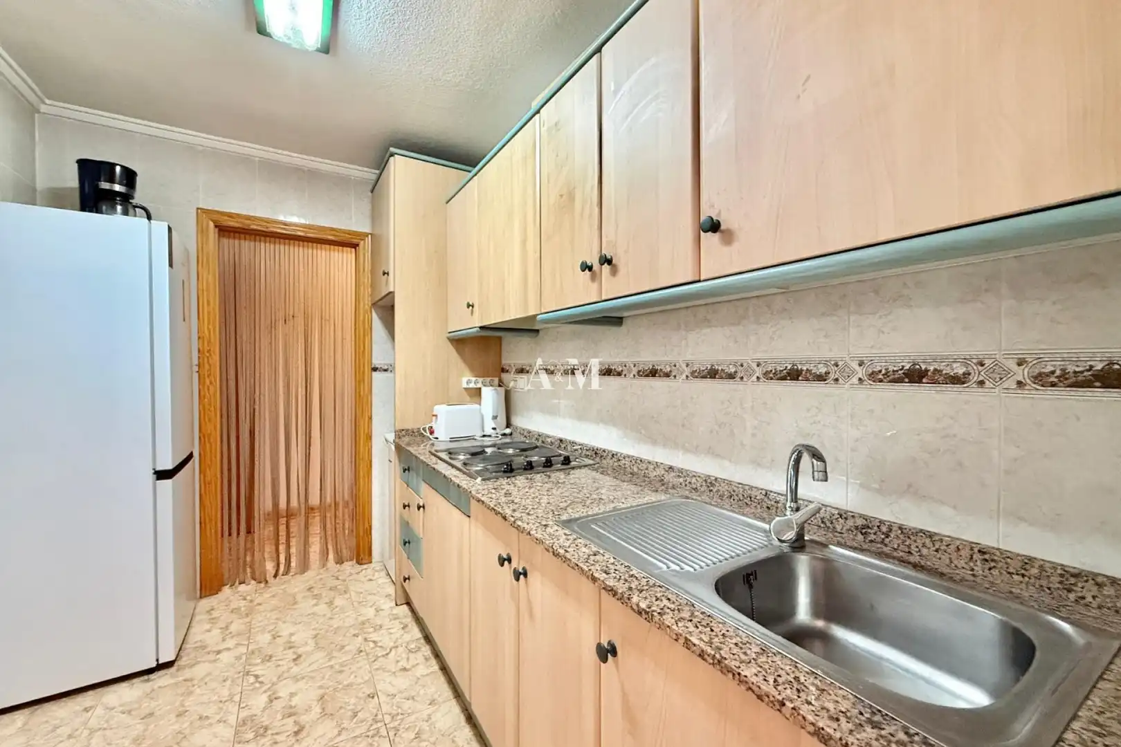 Cuina de Pis de lloguer en Torrevieja amb Calefacció, Terrassa i Moblat