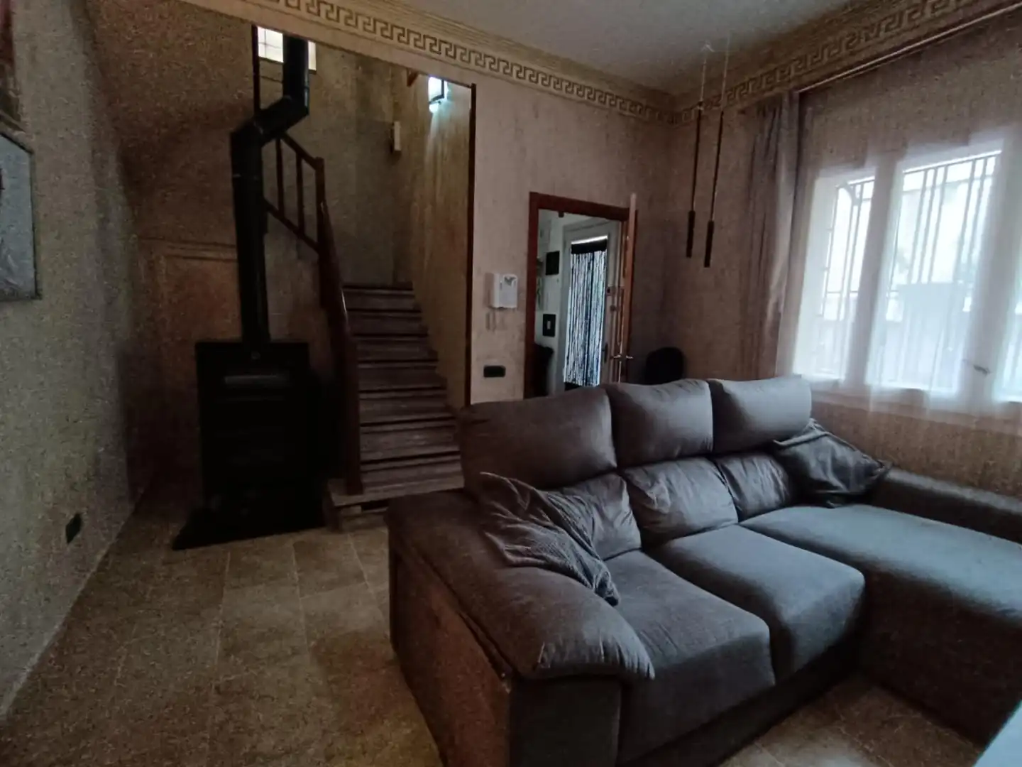 Wohnzimmer von Einfamilien-Reihenhaus zum Verkauf in Reus mit Heizung