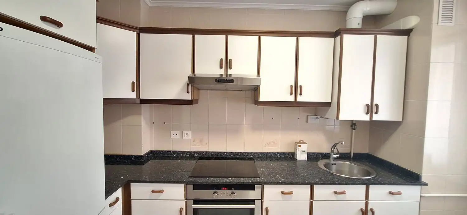 Kitchen of Flat for rent in Gijón   with Heating, Terrace and Swimming Pool