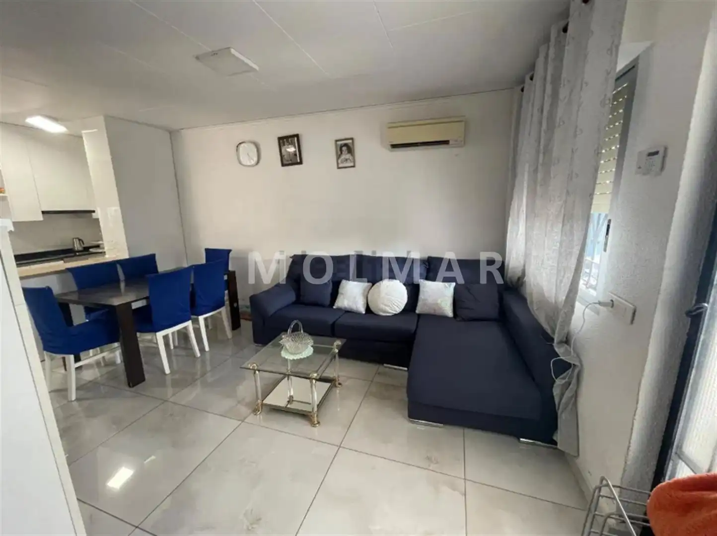 Sala d'estar de Casa o xalet en venda en Almazora / Almassora amb Aire condicionat, Jardí privat i Terrassa