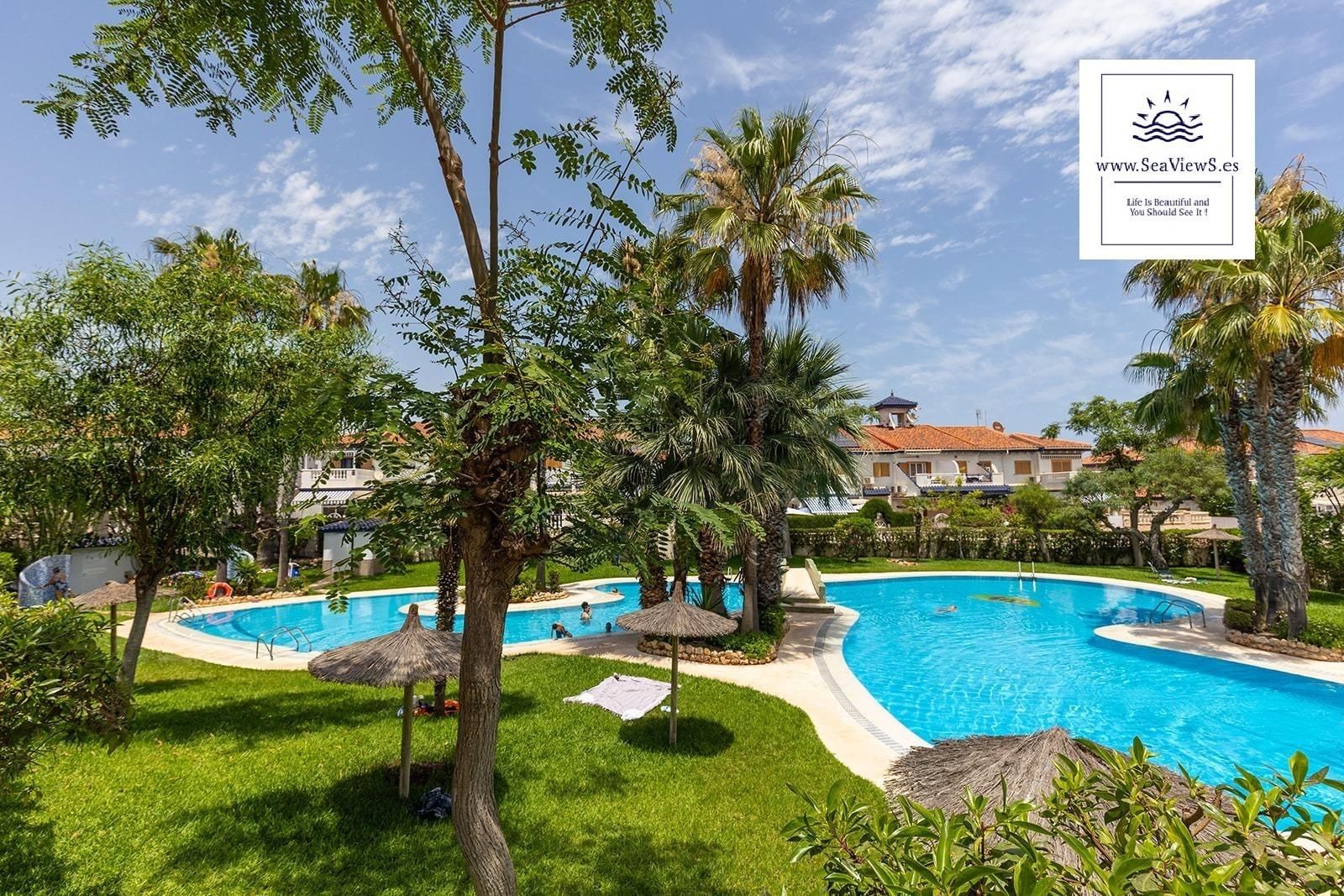 Swimming pool of Single-family semi-detached for sale in Torrevieja  with Air Conditioner, Heating and Terrace