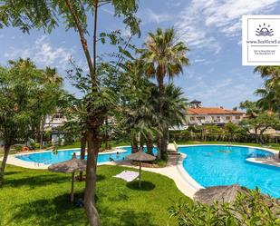 Swimming pool of Single-family semi-detached for sale in Torrevieja  with Air Conditioner, Heating and Terrace