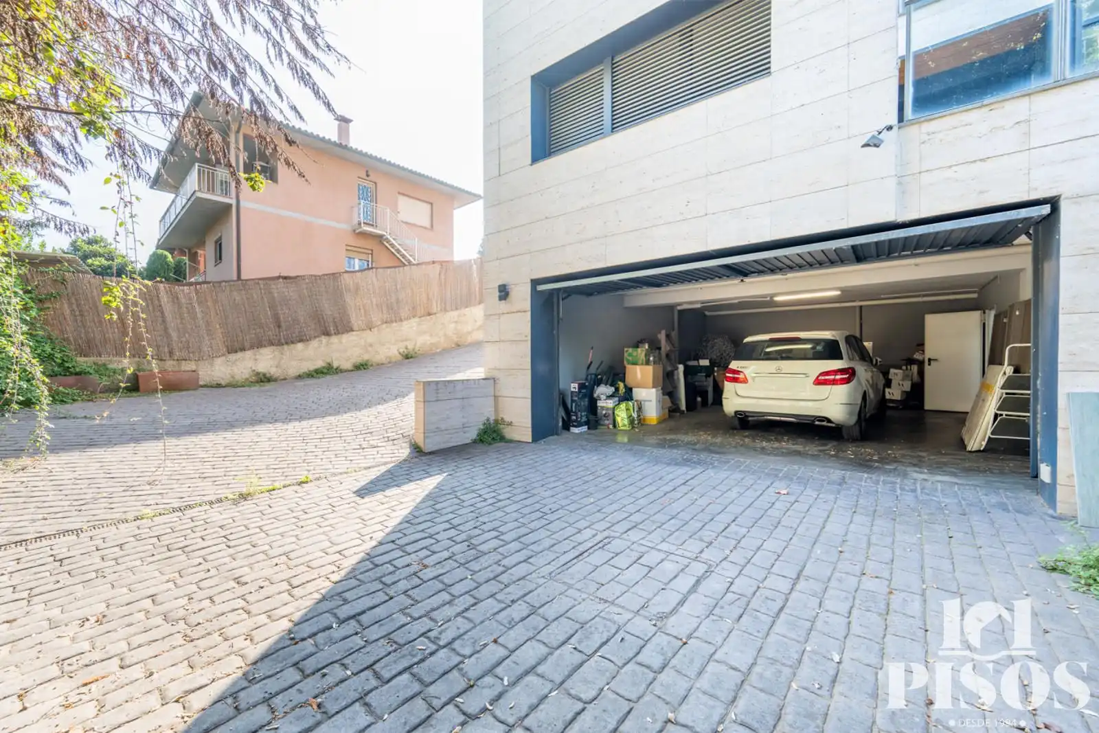 Parking of Houses for sale in Sant Cugat del Vallès  with Air Conditioner, Storage room and Swimming Pool