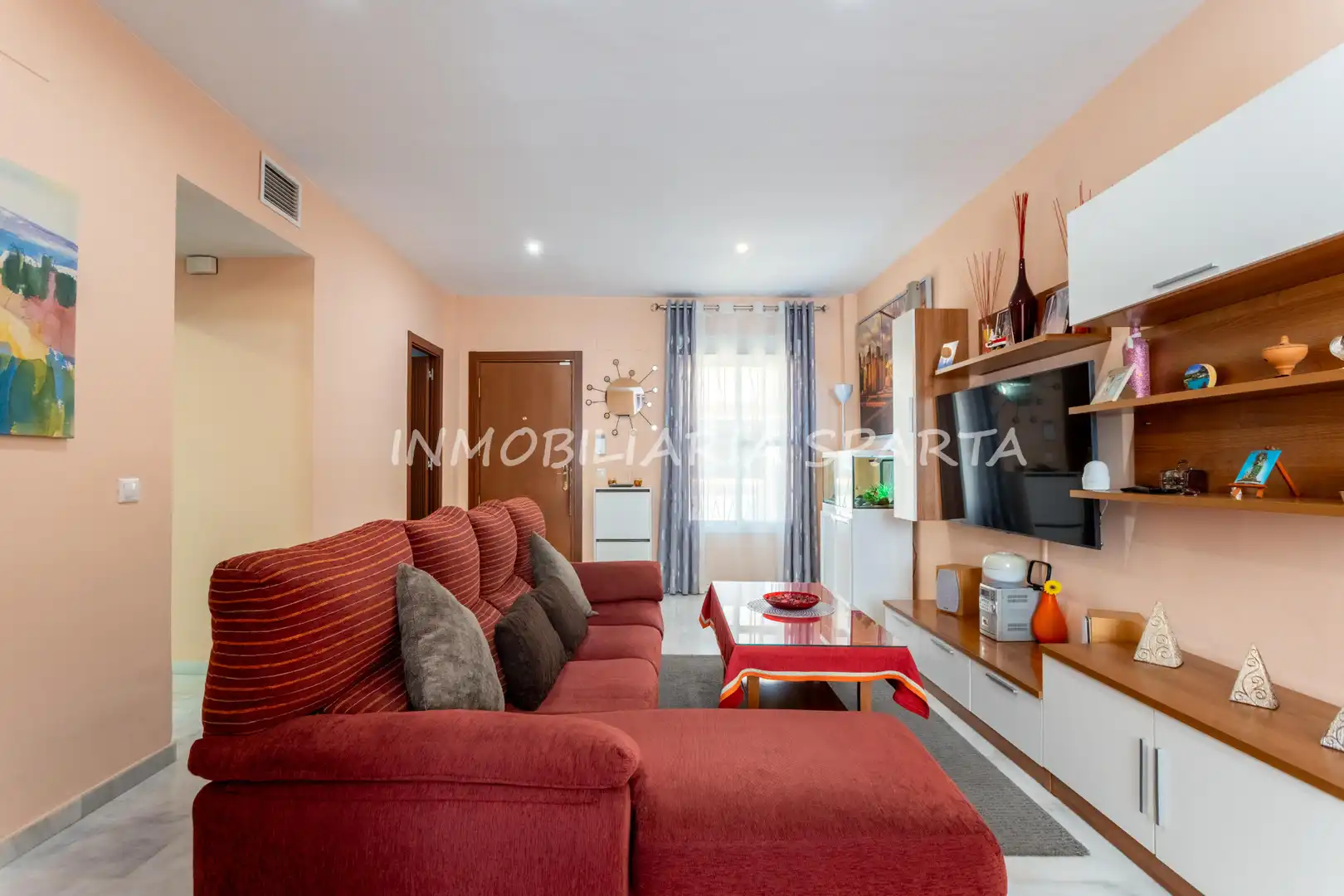 Sala de estar de Casa adosada en venta en Villanueva del Ariscal con Aire acondicionado, Calefacción y Jardín privado
