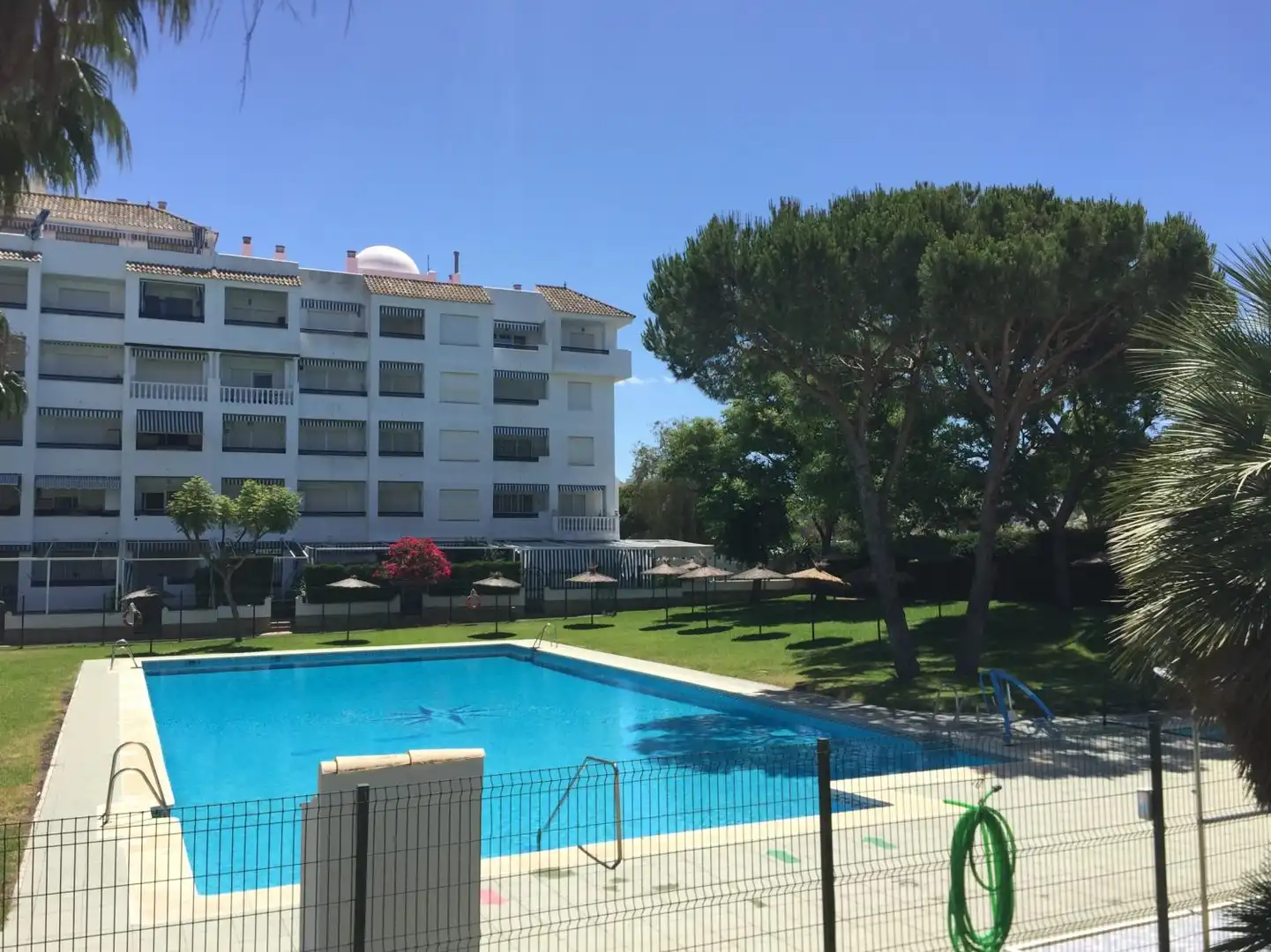 Piscina de Piso de alquiler en El Portil con Jardín privado, Terraza y Piscina