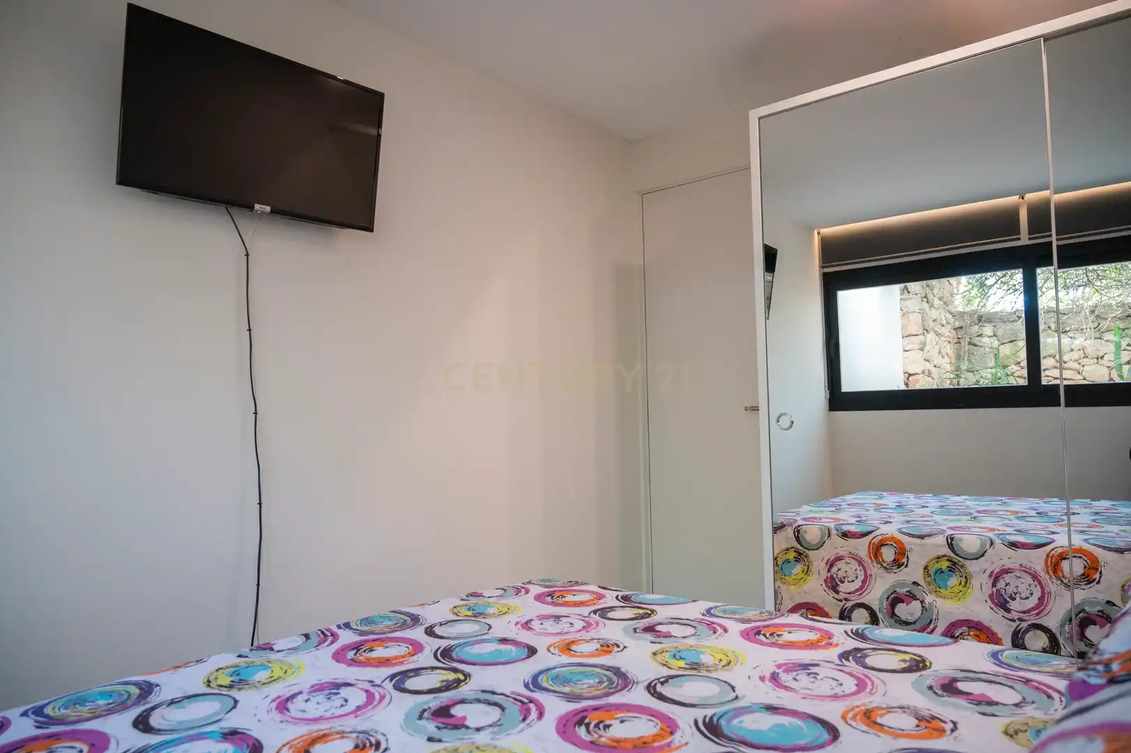 Habitación de Apartamento de alquiler en Santa Eulària des Riu con Aire acondicionado, Jardín privado y Piscina comunitaria