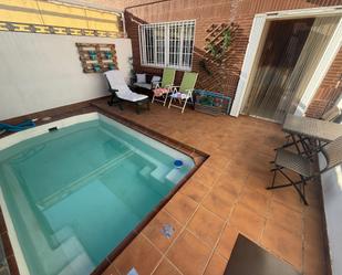 Swimming pool of Single-family semi-detached for sale in  Jaén Capital  with Air Conditioner, Heating and Terrace