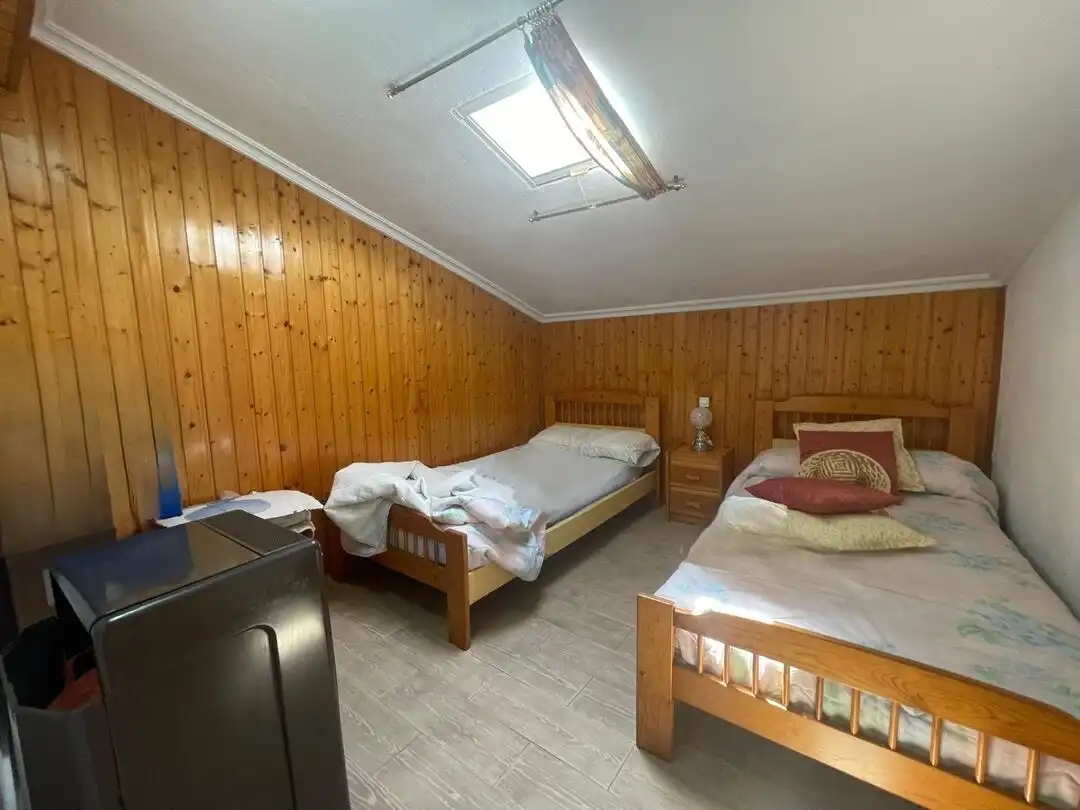 Habitación de Terreno en venta en Pueyo / Puiu