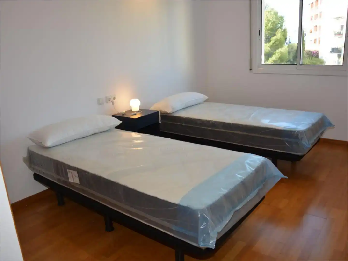 Schlafzimmer von Wohnung zur Miete in Sitges mit Klimaanlage, Schwimmbad und Balkon