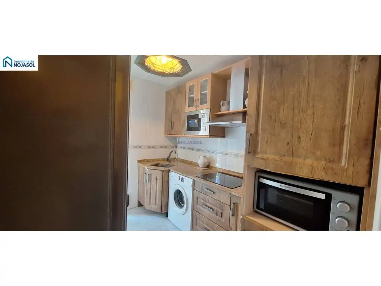 Cuina de Apartament de lloguer en Arnuero amb Calefacció, Terrassa i Moblat