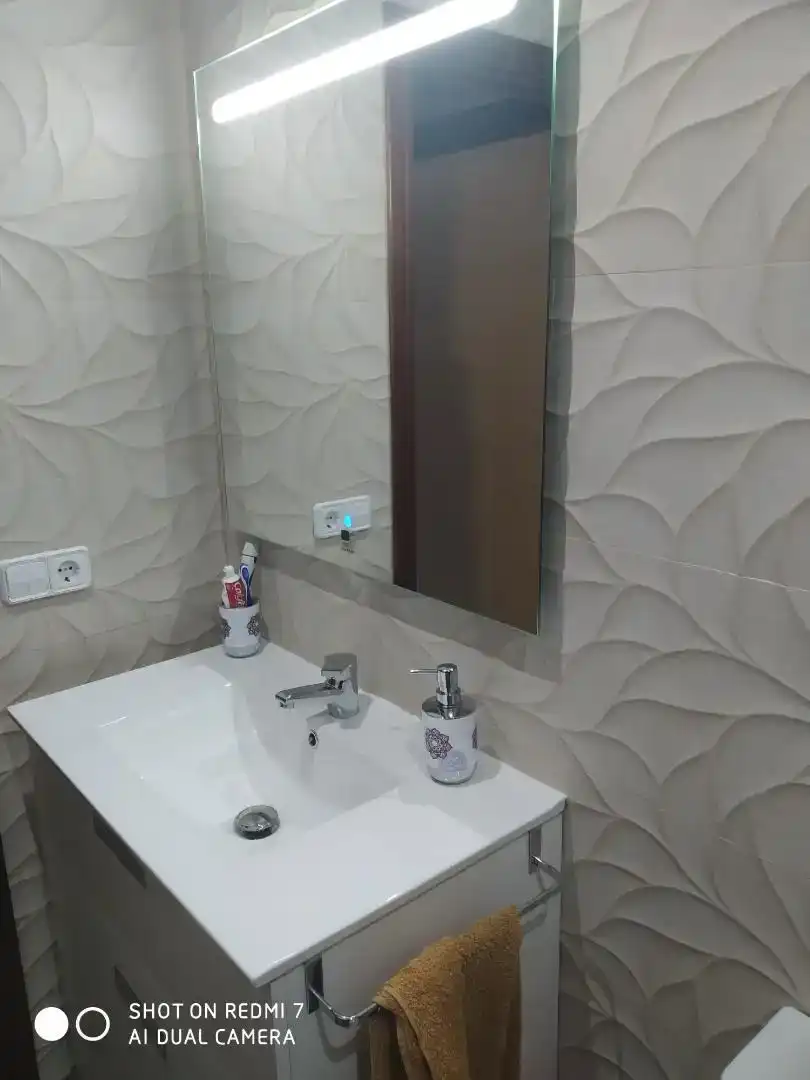 Badezimmer von Wohnung zum Verkauf in Mataró mit Klimaanlage und Balkon